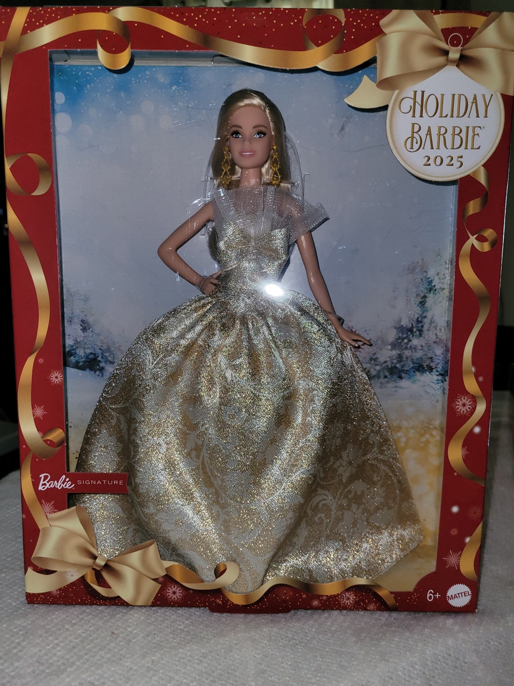 Mattel Holiday Barbie 2025 Gold Glitter Ball Gown